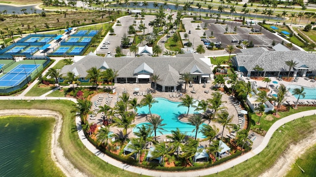 13339 SW Gingerline Dr, Port Saint Lucie, FL 34987 - bird's eye view of a pool area and a large body of water