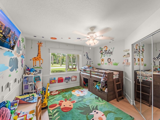8659 Thousand Pines Cir, West Palm Beach, FL 33411 - bedroom featuring a closet, a ceiling fan, and baseboards