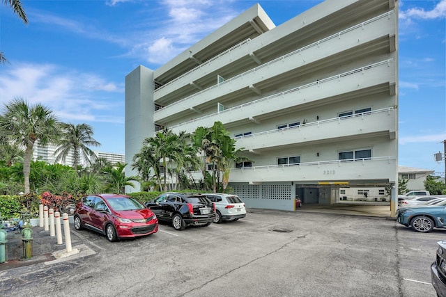3212 NE 12th St Unit 201, Pompano Beach, FL 33062 - view of property with uncovered parking