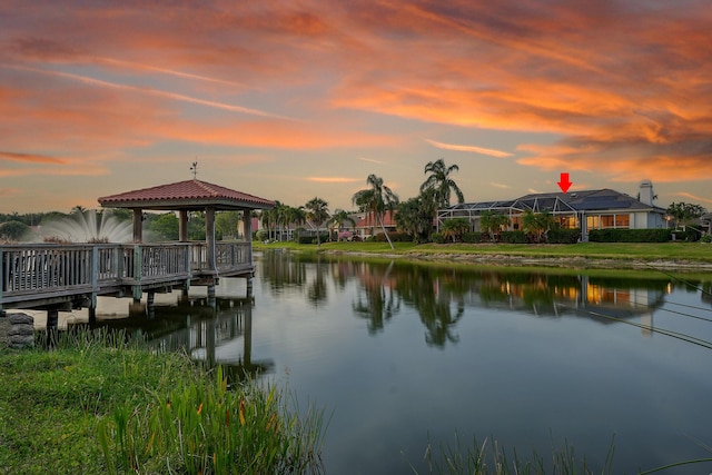 dock area featuring a gazebo and a water view