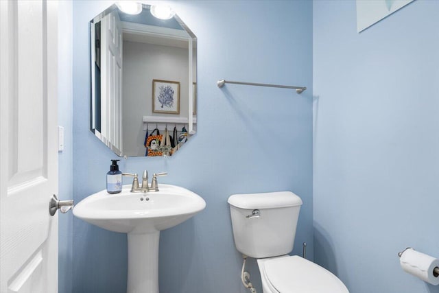 bathroom featuring toilet