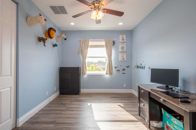 home office featuring wood finished floors, a ceiling fan, baseboards, and recessed lighting