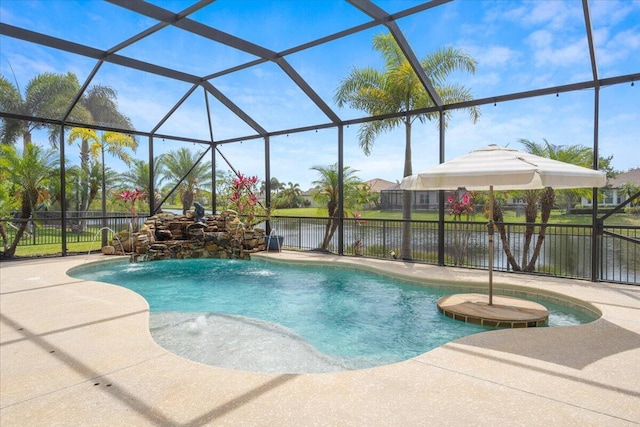 11400 SW Reston Ct, Port Saint Lucie, FL 34987 - view of pool featuring a patio area, a water view, and a lanai