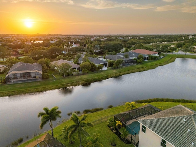 aerial perspective of suburban area featuring a large body of water