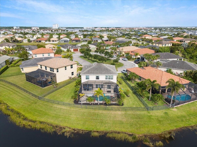 aerial perspective of suburban area featuring a large body of water
