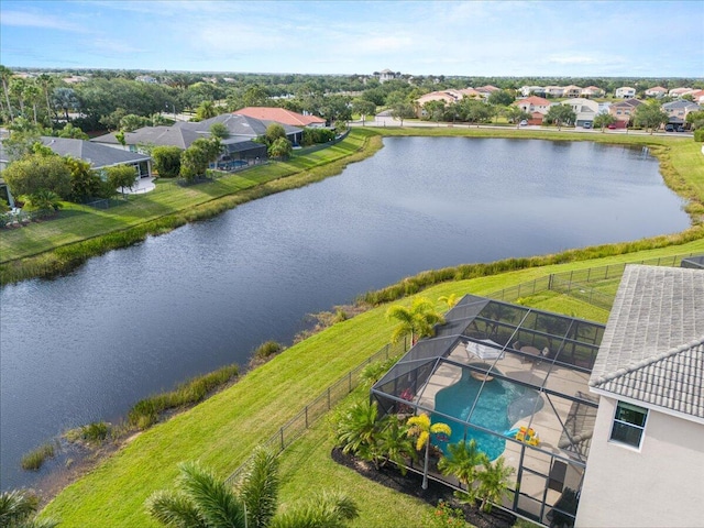 aerial perspective of suburban area featuring a nearby body of water