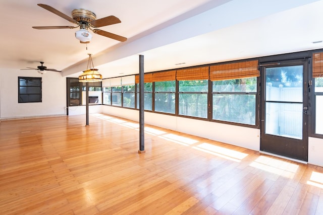 3984 SE Fairway E, Stuart, FL 34997 - unfurnished room with a ceiling fan and light wood-style floors