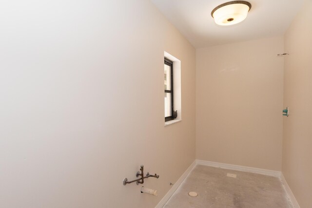 3984 SE Fairway E, Stuart, FL 34997 - laundry room with baseboards