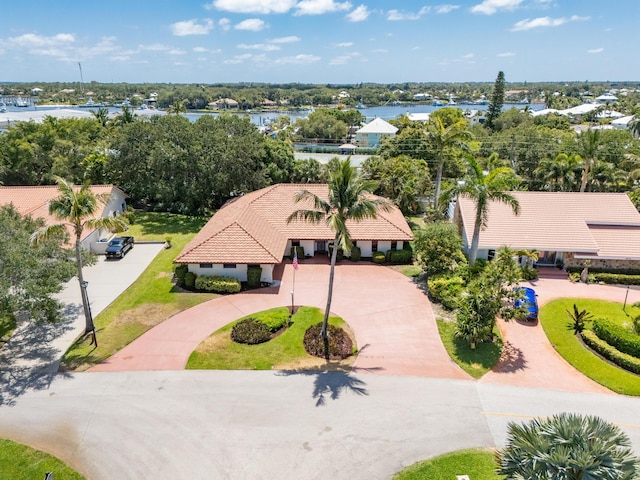 3984 SE Fairway E, Stuart, FL 34997 - birds eye view of property featuring a water view