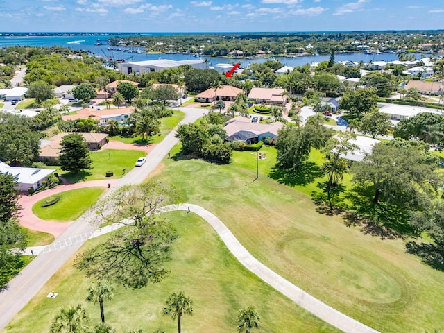 3984 SE Fairway E, Stuart, FL 34997 - aerial view featuring a water view, golf course view, and a residential view