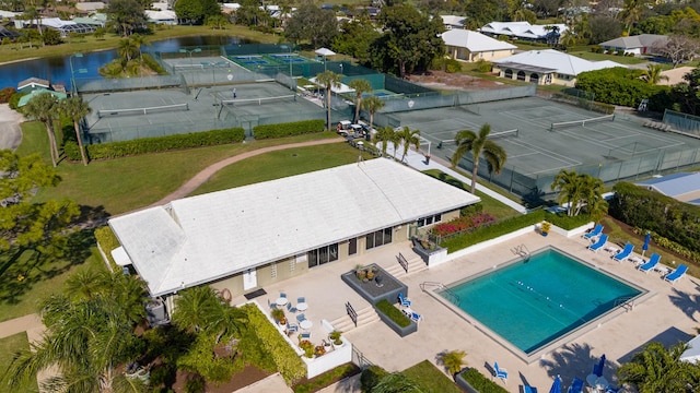 3984 SE Fairway E, Stuart, FL 34997 - drone / aerial view with a water view