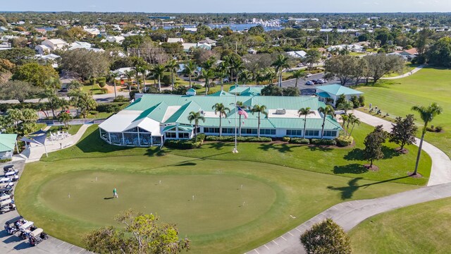 3984 SE Fairway E, Stuart, FL 34997 - bird's eye view featuring a residential view and view of golf course