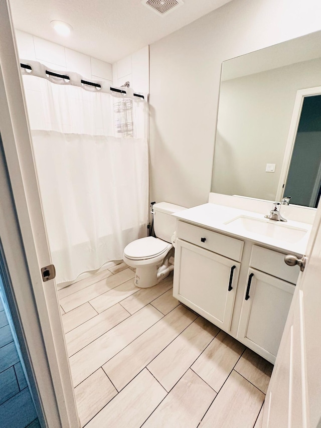 885 SW Squirrel Ave, Port Saint Lucie, FL 34953 - full bath with vanity, toilet, and shower / bath combo with shower curtain