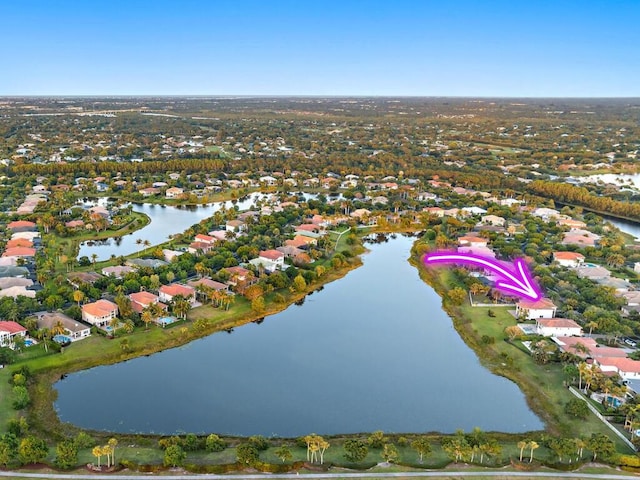 aerial view featuring a water view and a residential view