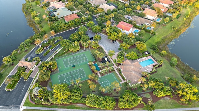 aerial view with a residential view and a water view