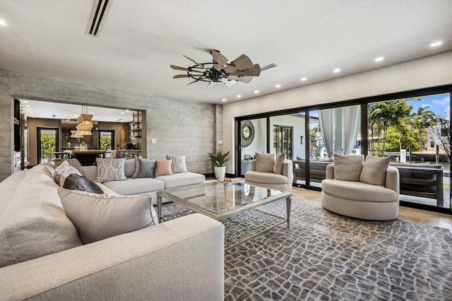 2409 NE 18th Ave, Wilton Manors, FL 33305 - living room with recessed lighting, plenty of natural light, and a ceiling fan