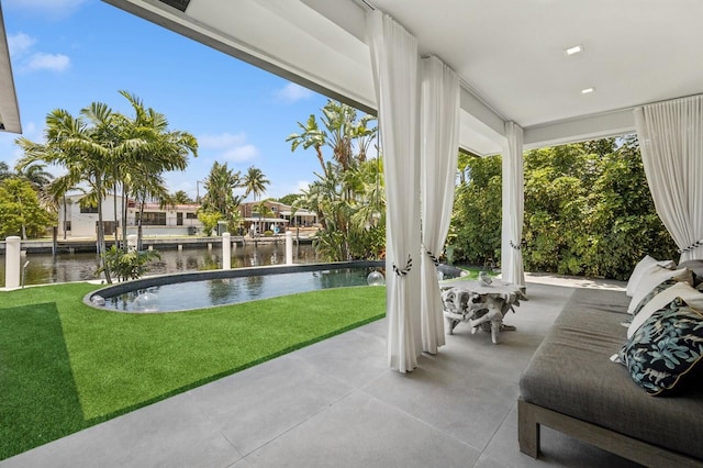 2409 NE 18th Ave, Wilton Manors, FL 33305 - view of patio / terrace featuring a water view