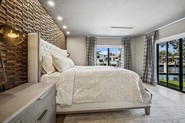 2409 NE 18th Ave, Wilton Manors, FL 33305 - bedroom featuring access to outside and recessed lighting