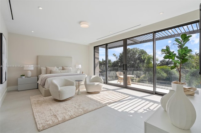 bedroom with baseboards, access to outside, and multiple windows