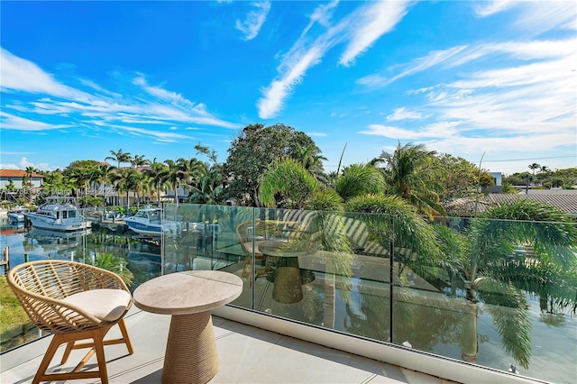 balcony featuring a water view
