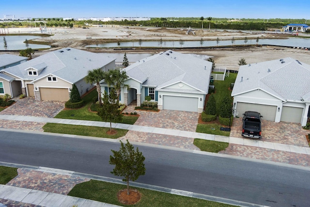 bird's eye view with a water view