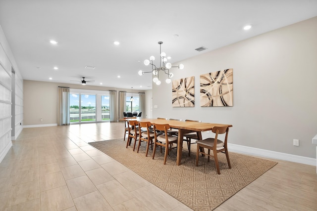 dining area featuring ceiling fan with notable chandelier, baseboards, visible vents, and recessed lighting