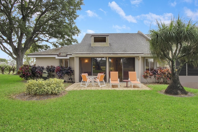 6907 Fountains Cir, Lake Worth, FL 33467 - back of property featuring a patio area, a yard, roof with shingles, and stucco siding