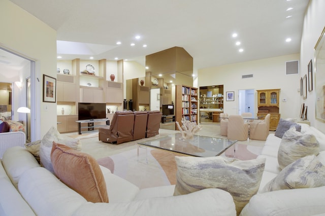 6907 Fountains Cir, Lake Worth, FL 33467 - living room featuring a towering ceiling and recessed lighting