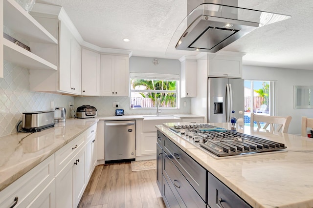 6290 Windchime Pl, Boynton Beach, FL 33472 - kitchen featuring open shelves, a textured ceiling, a sink, appliances with stainless steel finishes, and a wealth of natural light