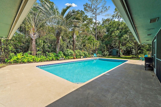 pool featuring a patio area