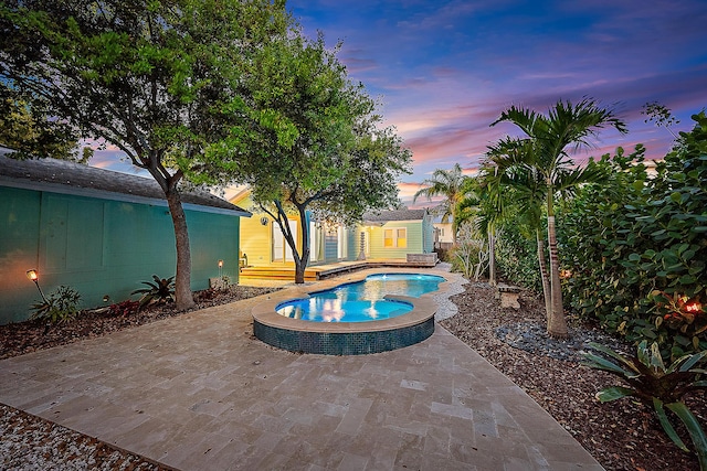 725 N Ocean Breeze, Lake Worth Beach, FL 33460 - view of pool featuring a patio area and an outdoor hot tub