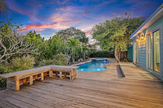 725 N Ocean Breeze, Lake Worth Beach, FL 33460 - view of pool featuring a deck, a fenced backyard, and a pool with connected hot tub