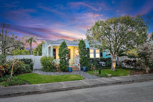 725 N Ocean Breeze, Lake Worth Beach, FL 33460 - view of front of home featuring fence and a porch