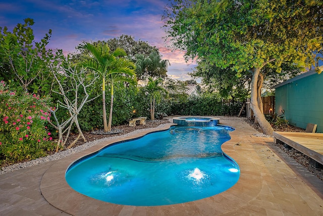 725 N Ocean Breeze, Lake Worth Beach, FL 33460 - view of pool featuring a fenced backyard and a pool with connected hot tub