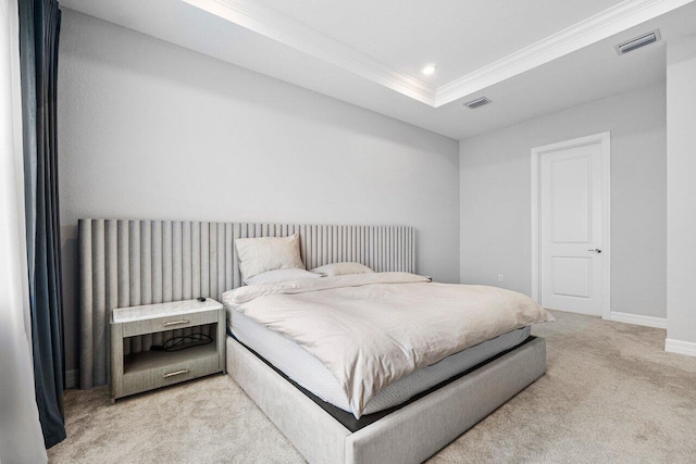 bedroom with baseboards, ornamental molding, light colored carpet, and visible vents