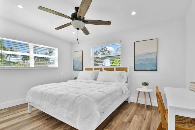 bedroom with recessed lighting, baseboards, a ceiling fan, and light wood-style floors