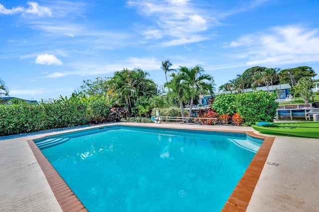 view of pool featuring a fenced in pool