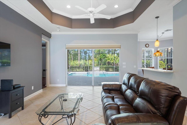 living room featuring light tile patterned flooring, a ceiling fan, recessed lighting, and baseboards