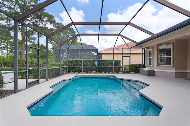 pool featuring a patio area