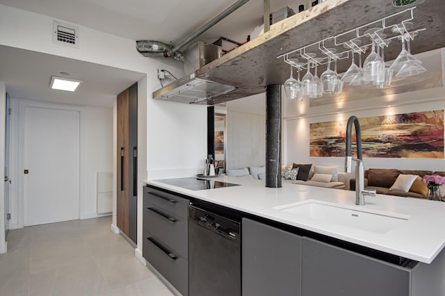 4101 N Ocean Blvd Unit 504, Boca Raton, FL 33431 - kitchen featuring a sink, black electric cooktop, dishwashing machine, visible vents, and open floor plan