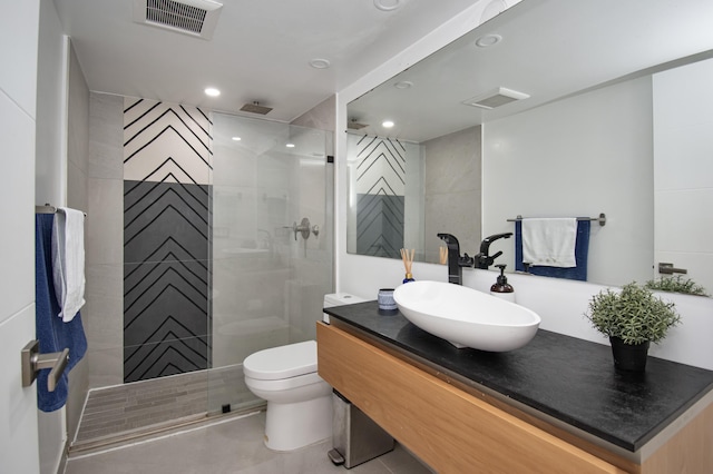 4101 N Ocean Blvd Unit 504, Boca Raton, FL 33431 - bathroom featuring recessed lighting, a shower stall, vanity, toilet, and visible vents