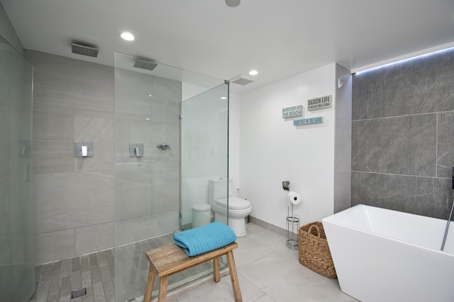 4101 N Ocean Blvd Unit 504, Boca Raton, FL 33431 - full bath with tile patterned floors, a freestanding tub, toilet, and walk in shower