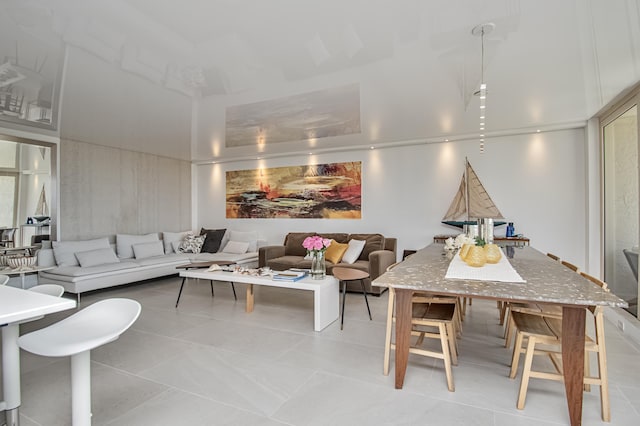 4101 N Ocean Blvd Unit 504, Boca Raton, FL 33431 - living area with light tile patterned floors and a high ceiling