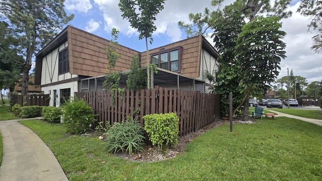 102 Weybridge Cir Unit D, Royal Palm Beach, FL 33411 - view of side of home with mansard roof