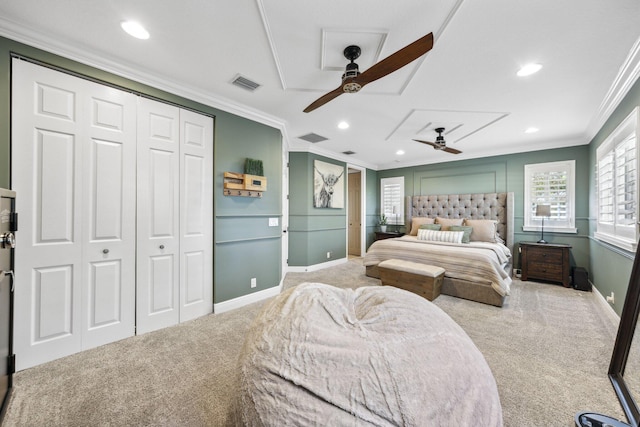 carpeted bedroom featuring crown molding, recessed lighting, baseboards, and visible vents
