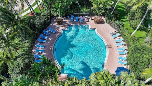 community pool with a patio