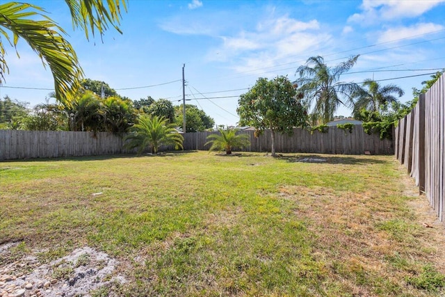 view of yard featuring a fenced backyard