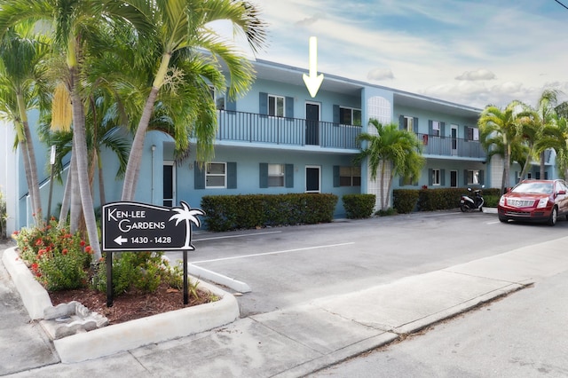 1432 S Lakeside Dr Unit 11, Lake Worth Beach, FL 33460 - view of property featuring uncovered parking