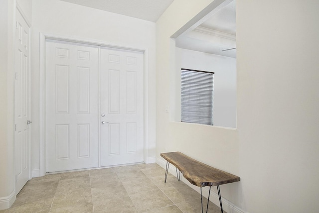 interior space featuring baseboards