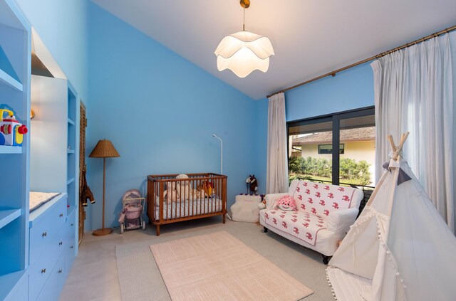bedroom with light colored carpet